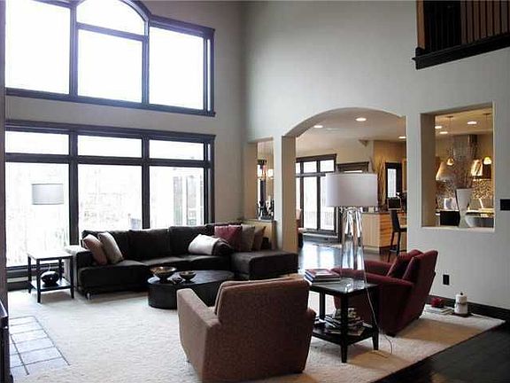Great Room: 2-Story GR w/ wall of windows for natural Sunlight.