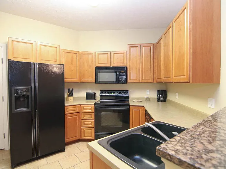Our open kitchens offer ample counter space, plus a breakfast bar. perfect for preparing meals or hosting gatherings!