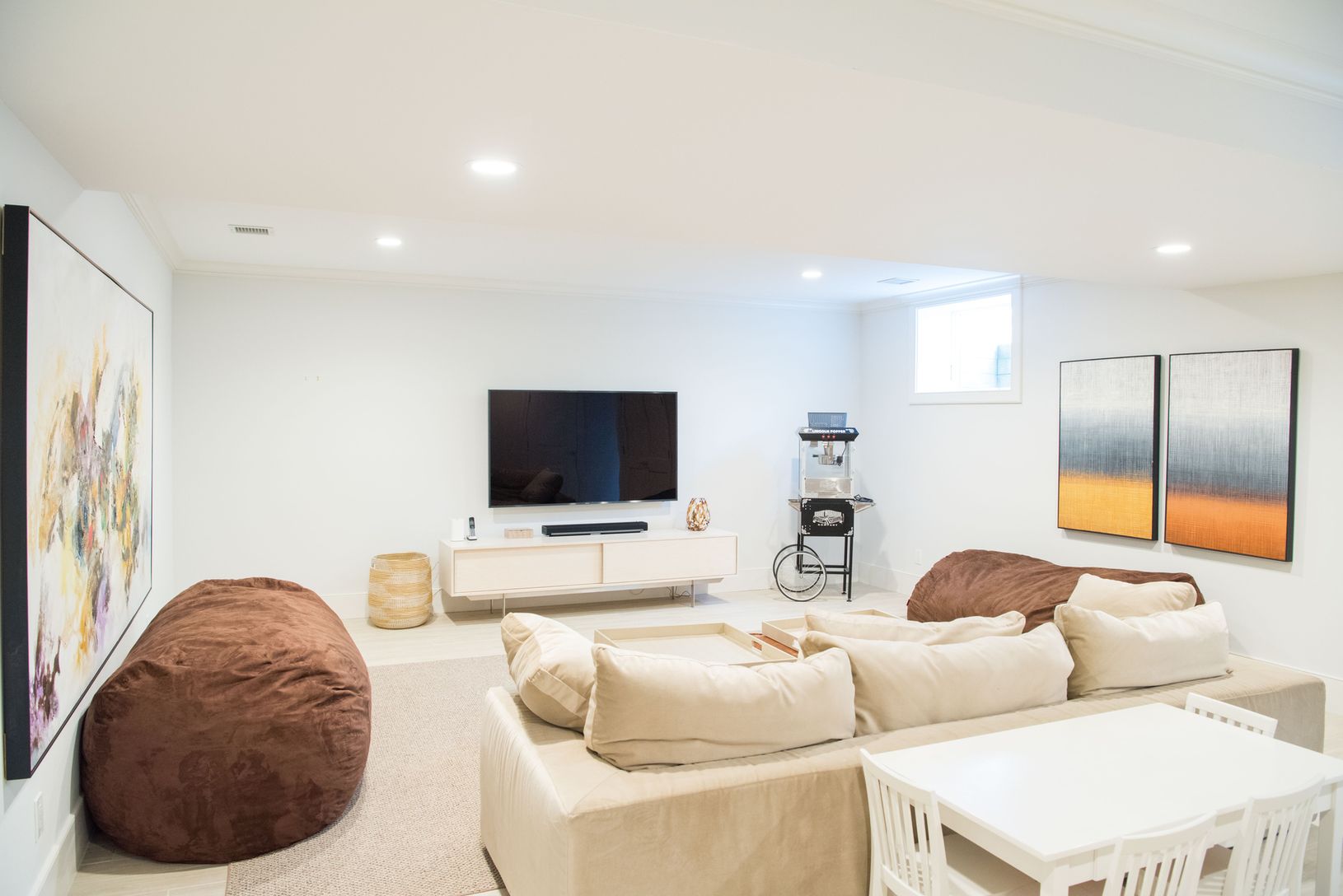  Media Room with 75" TV and Surround Sound. Popcorn machine, weights, foosball. 