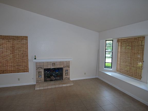 Living roomDoors to 4th bedroom or officeLiving room with bench seat at window