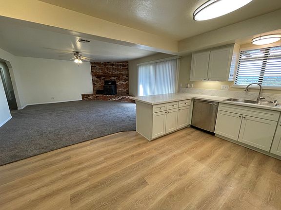 Open floor plan with wood burning stove