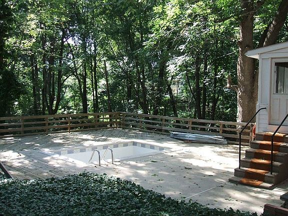 Wooded area to north