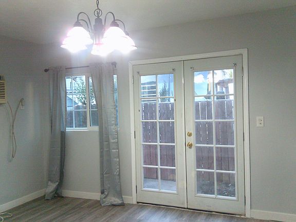 Living room with patio door.