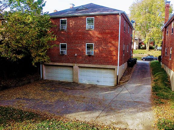 Four Car Garage With Ample Parking Space
