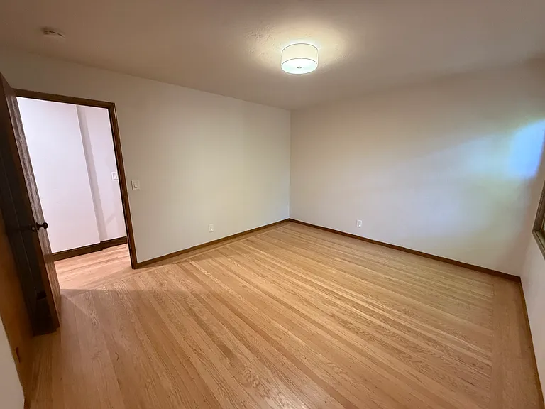 Bedroom #2 has one window and a single door closet.