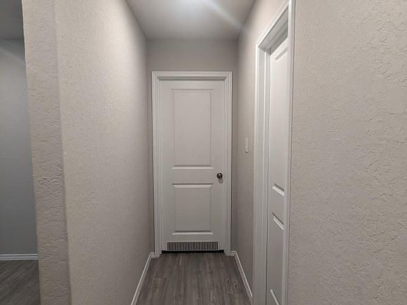 Shared hall way looking at room #1 and shared bathroom