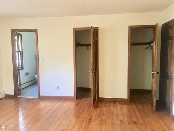 Bedroom with walk in closet space