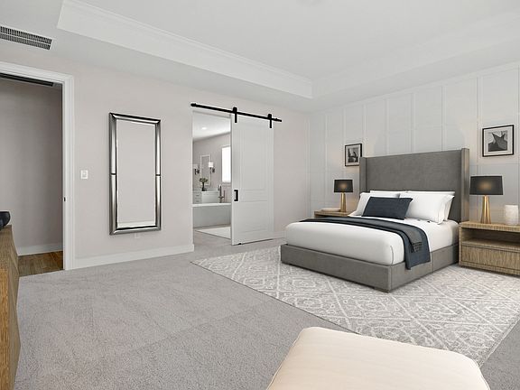 Primary suite with decorative feature wall
