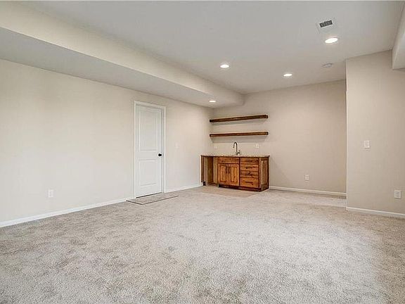Downstairs room and wet bar 