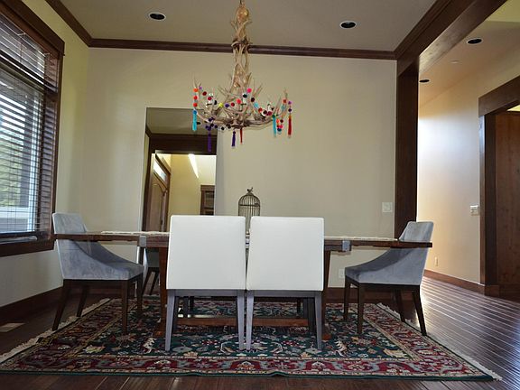 Dining table just left of the kitchen and great room.