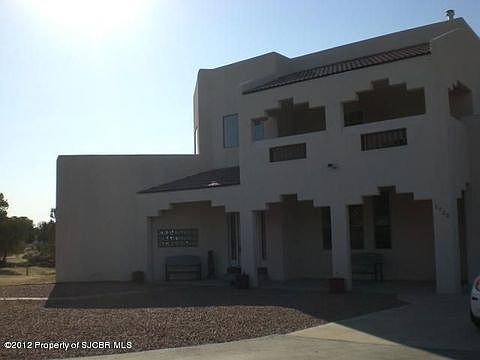  Natural landscaping graces the front of the property