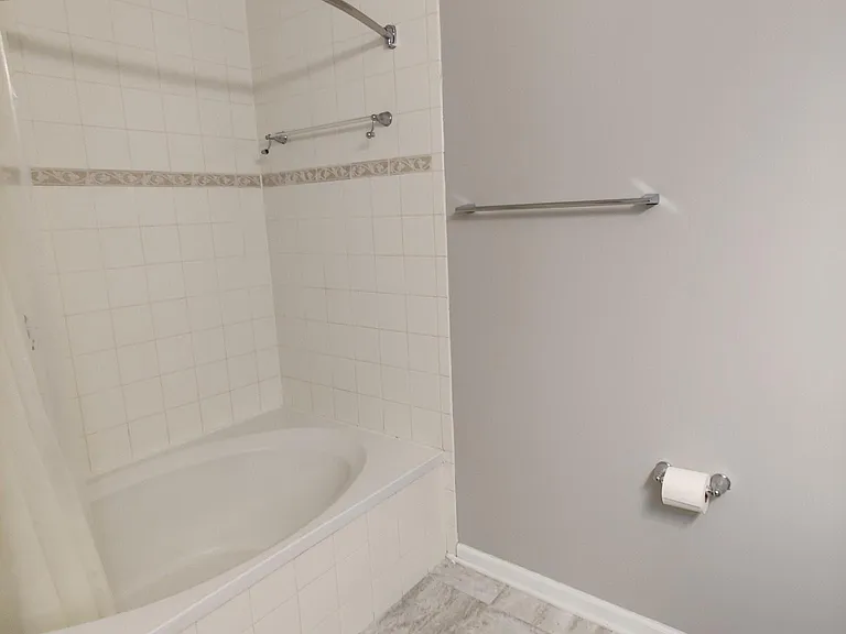 Soaking tub and rain showerhead