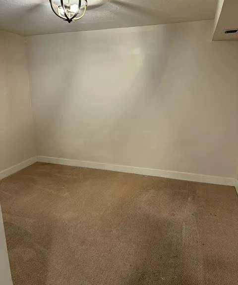 Downstairs bedroom 10'9" by 11'2"