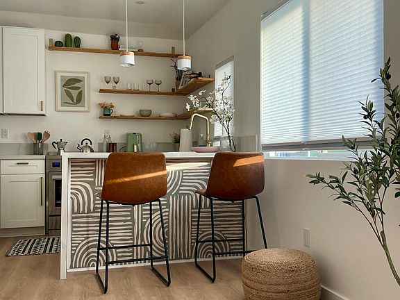 Amazing view of your fully functional kitchen.
Peninsula can function as a desk.