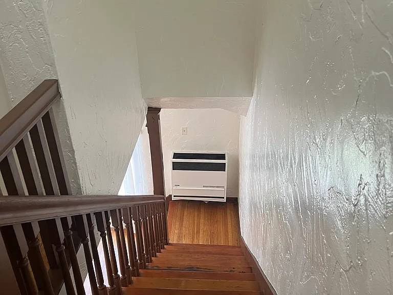 Wood stairs, new gas heater
