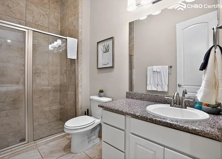 Bright bathroom with storage vanity