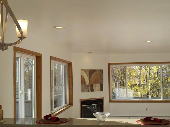 open living room w large windows