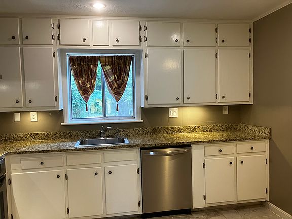 Kitchen with window to back yard