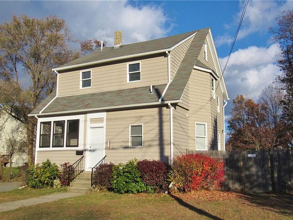 Gorgeous 4 Bed 2 Full Bath Colonial Nestled on a Huge Fenced in Yard in a Great Location!