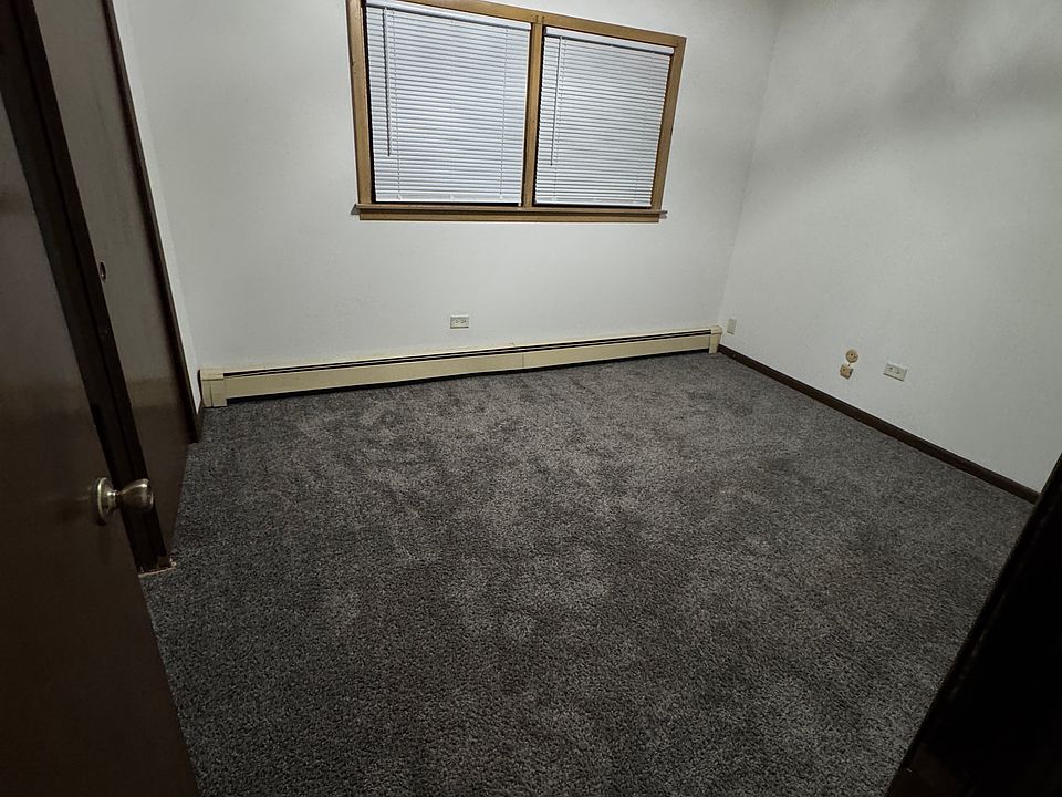 Bedroom one with new ceiling fan for additional air/heat
