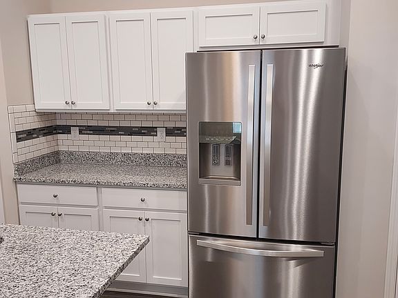 New French Door refrigerator with ice and water in door.