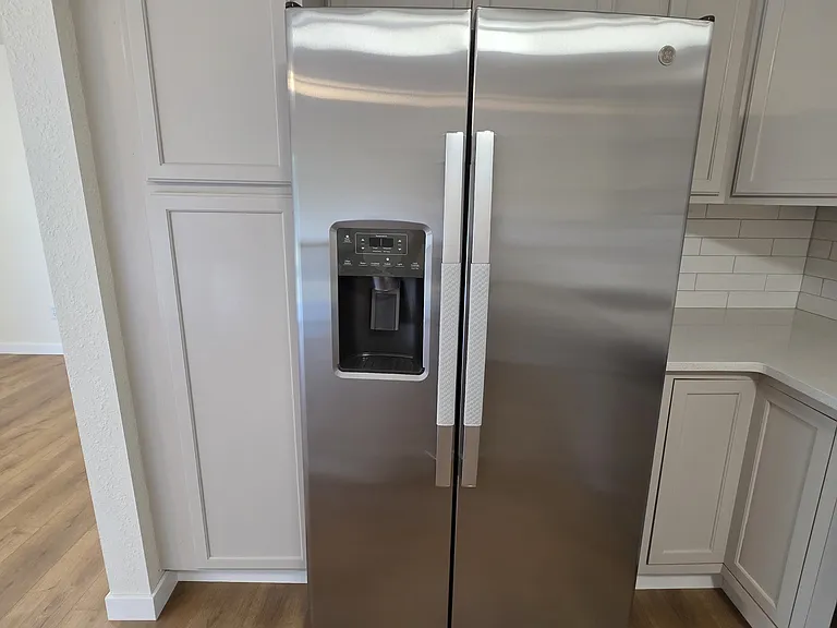 Brand new refrigerator and a pantry