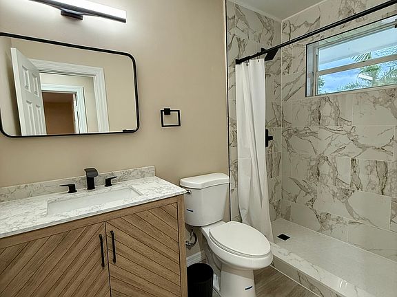 Spacious bathroom shared by only 2 roommates.