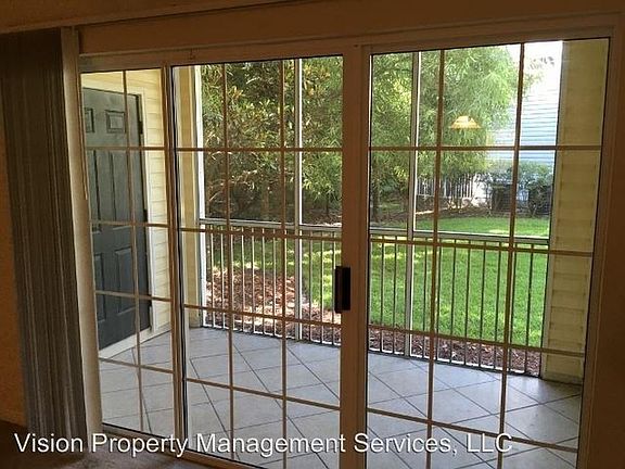 Back Lanai looking to Woods and Outdoor Storage