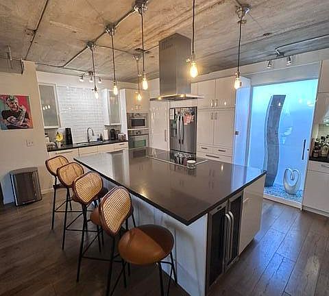 4th image of 6930 E 3RD Street