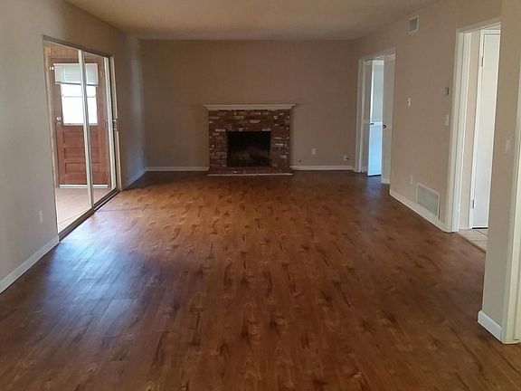 Living room and Dining room combined. Sliding glass door on left goes to 12'X40' playroom.