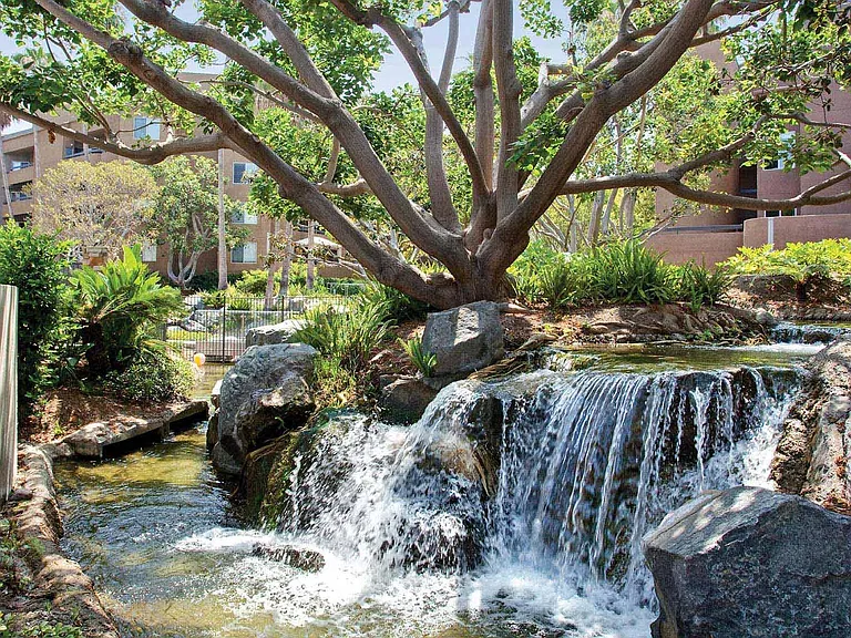 Take a stroll around the pond and enjoy the beautiful landscaping throughout the community