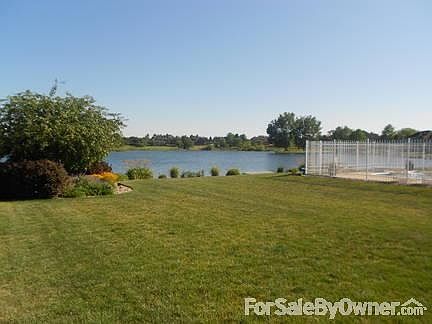covered deck with hot tub