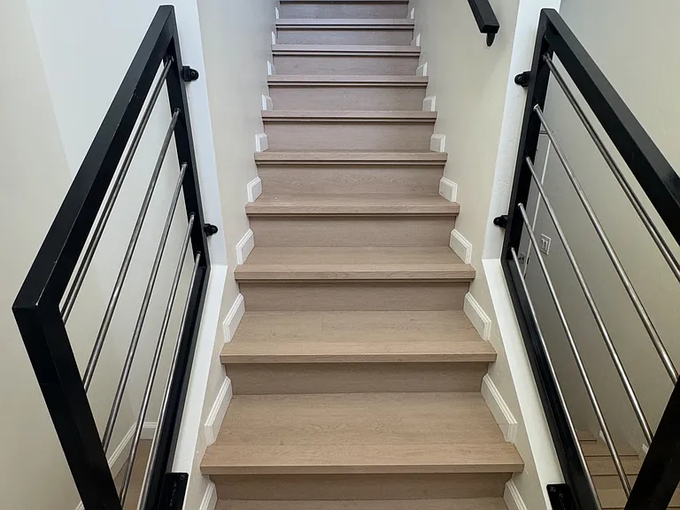 Heading upstairs to the main flloor from the entryway.