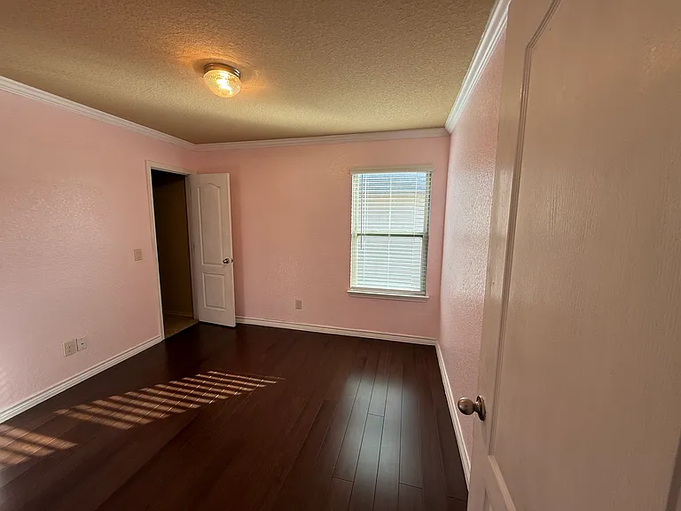 3rd bedroom with incredible light from window during the day