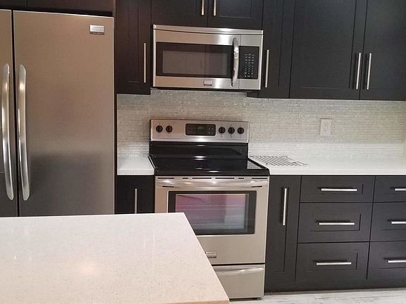 5th image of 3723 Carambola Cir N