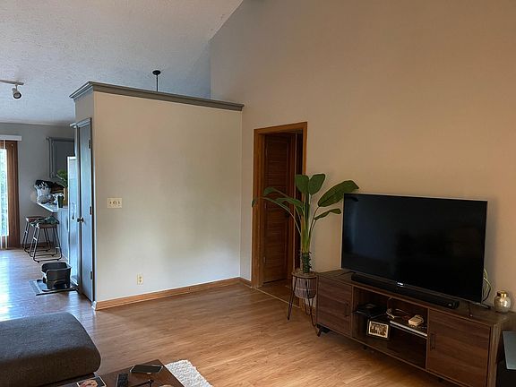 Living Room off kitchen. complete interior painted in 2020 in a light grey through out.