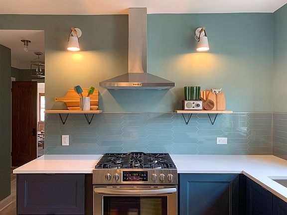 Stylish new kitchen with quartz countertops and upgraded stainless steel appliances