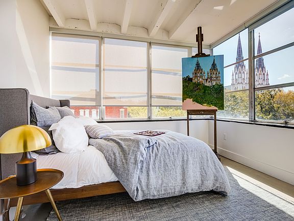 Bedroom with views of downtown