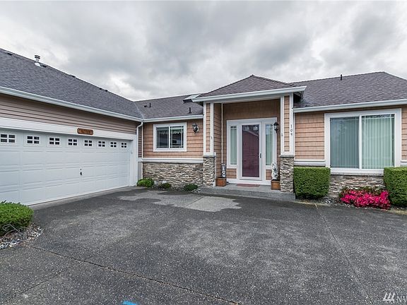 Another front view showing the door of the oversized 2 car garage.