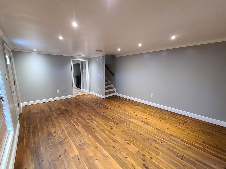 Large living room with new flooring.