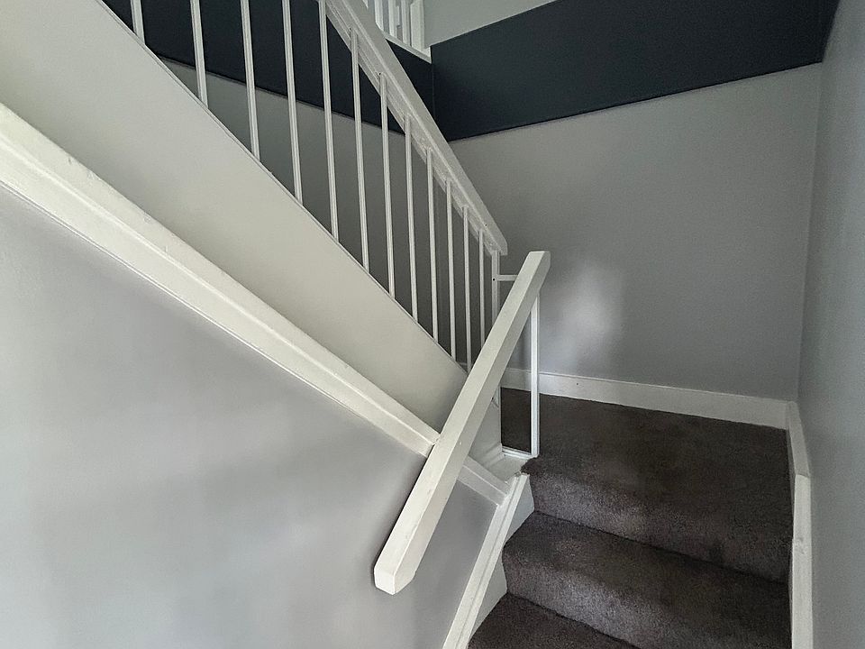 stairs going up from outside entrance. This is a second floor unit.
