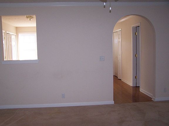 Arch and passthrough window in Living Room to Kitchen