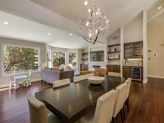 Living/Dining with views to pool and greenbelt