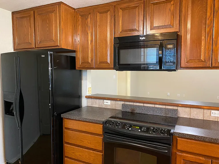 Kitchen with view to Great Room
Refrigerator only for you to see placement of your OWN refrigerator.