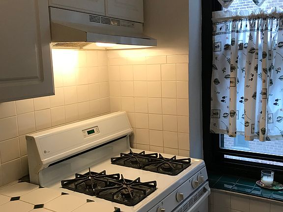 2nd image of 3245 90th St APT 311