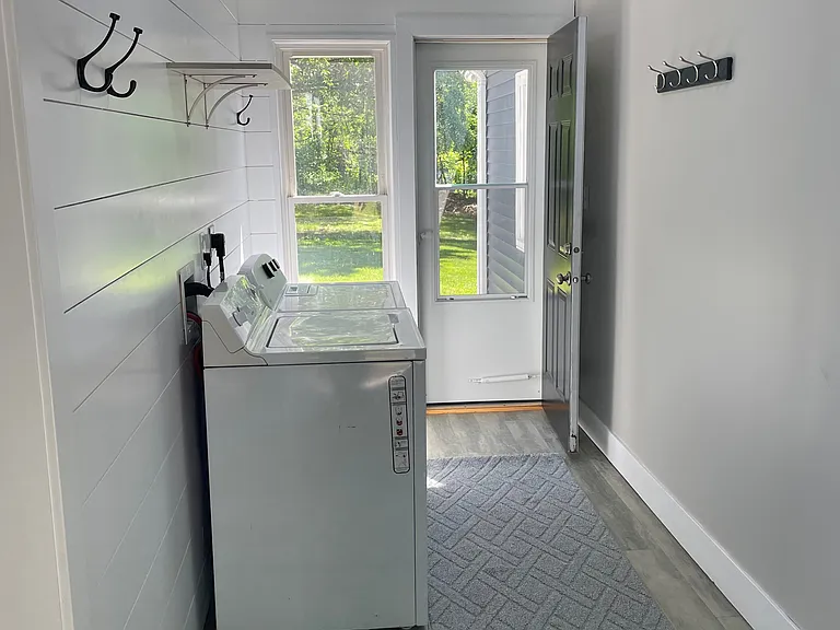 Laundry Room Breezeway to walks through to the garage, front and back.