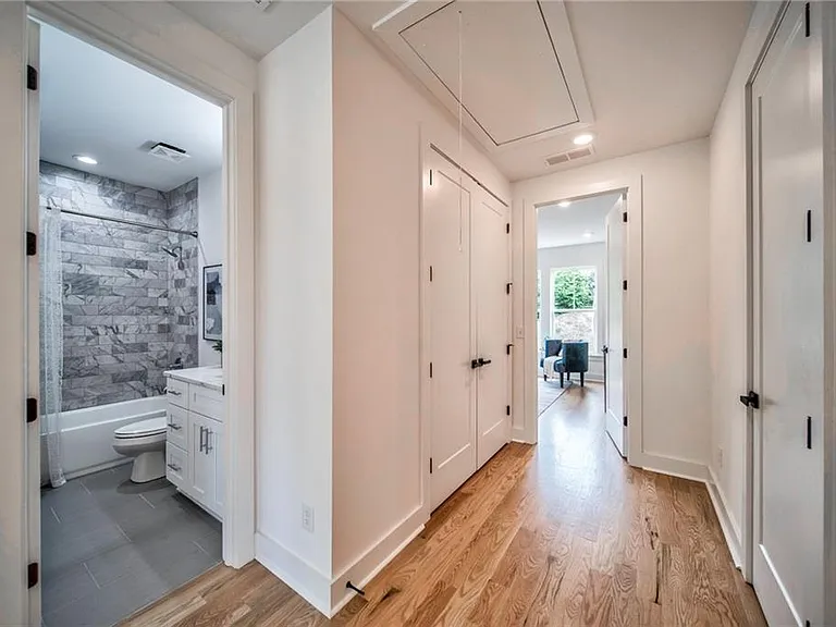 Hallway to the Master BedRoom, laundry on the left