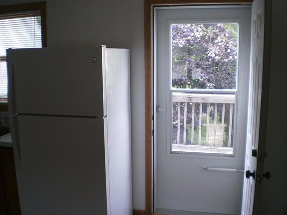 Kitchen door to large rear private deck