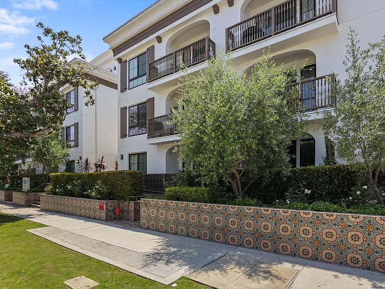 Sidewalk View of Kelton Madera
