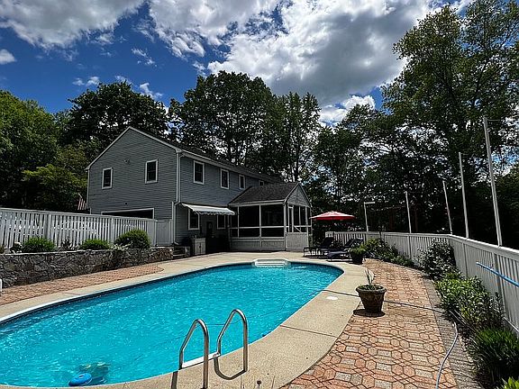 POOL VIEW FROM SIDE YARD